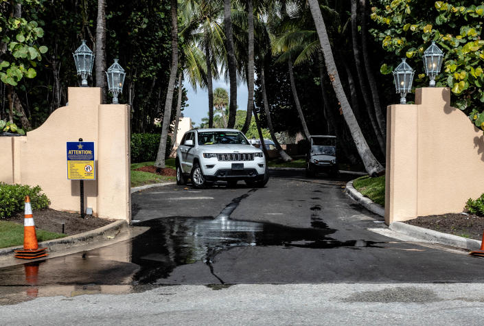 A security vehicle is parked inside one of Mar-a-Lago's gates along South Ocean Boulevard on Wednesday.