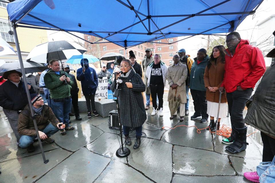JerriAnne Boggis of the Black Heritage Trail of New Hampshire speaks in support of Mamadou Dembele during a protest held at the African Burying Ground Memorial Park in Portsmouth Sunday, Dec. 3, 2023